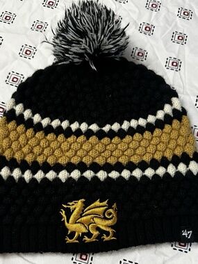 Cambria Women’s Winter Hat Logo Bubble Pattern Black Yellow White unisex puff